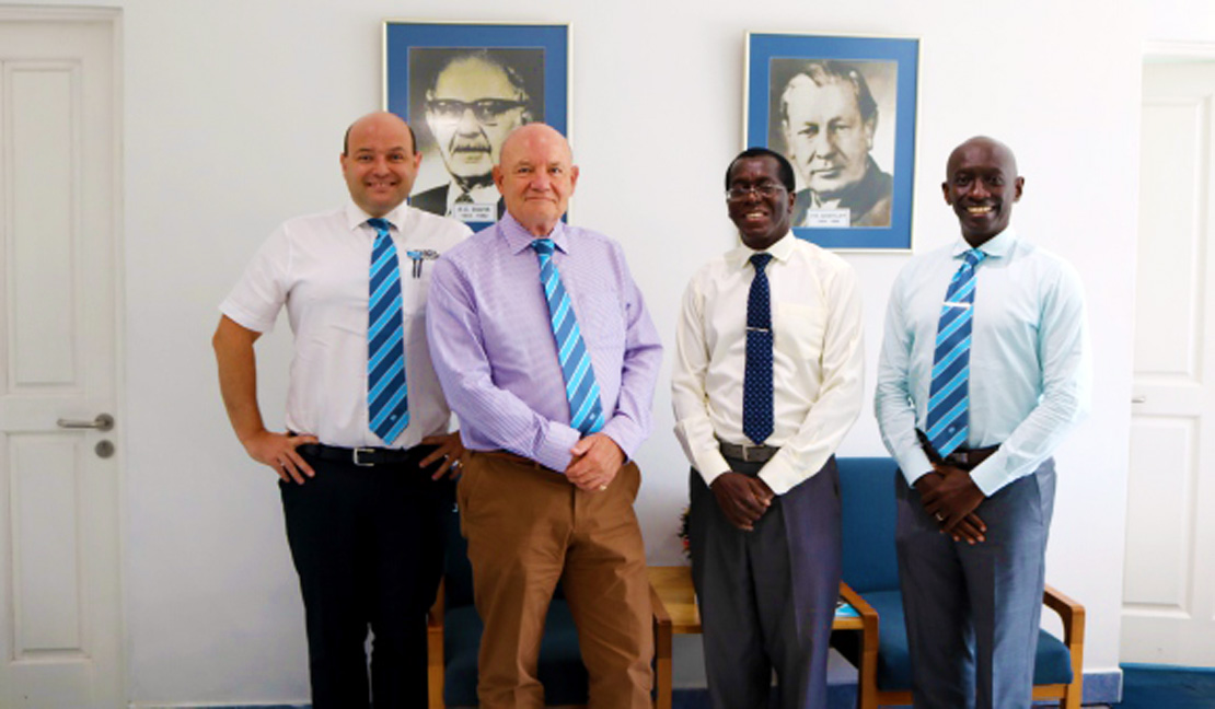 Outgoing MD Dr. MAS Waweru is pictured with Group Chairman Alec Davis and Group CEO David Gatende at D&S HO and incoming MD Edward Davis.